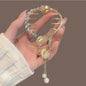 Elegante Haarkralle mit Blumen-Quaste – Schmetterling, Strass & Perlen – Haarclip für Damen | Dutt- & Zopfhalter Accessoire